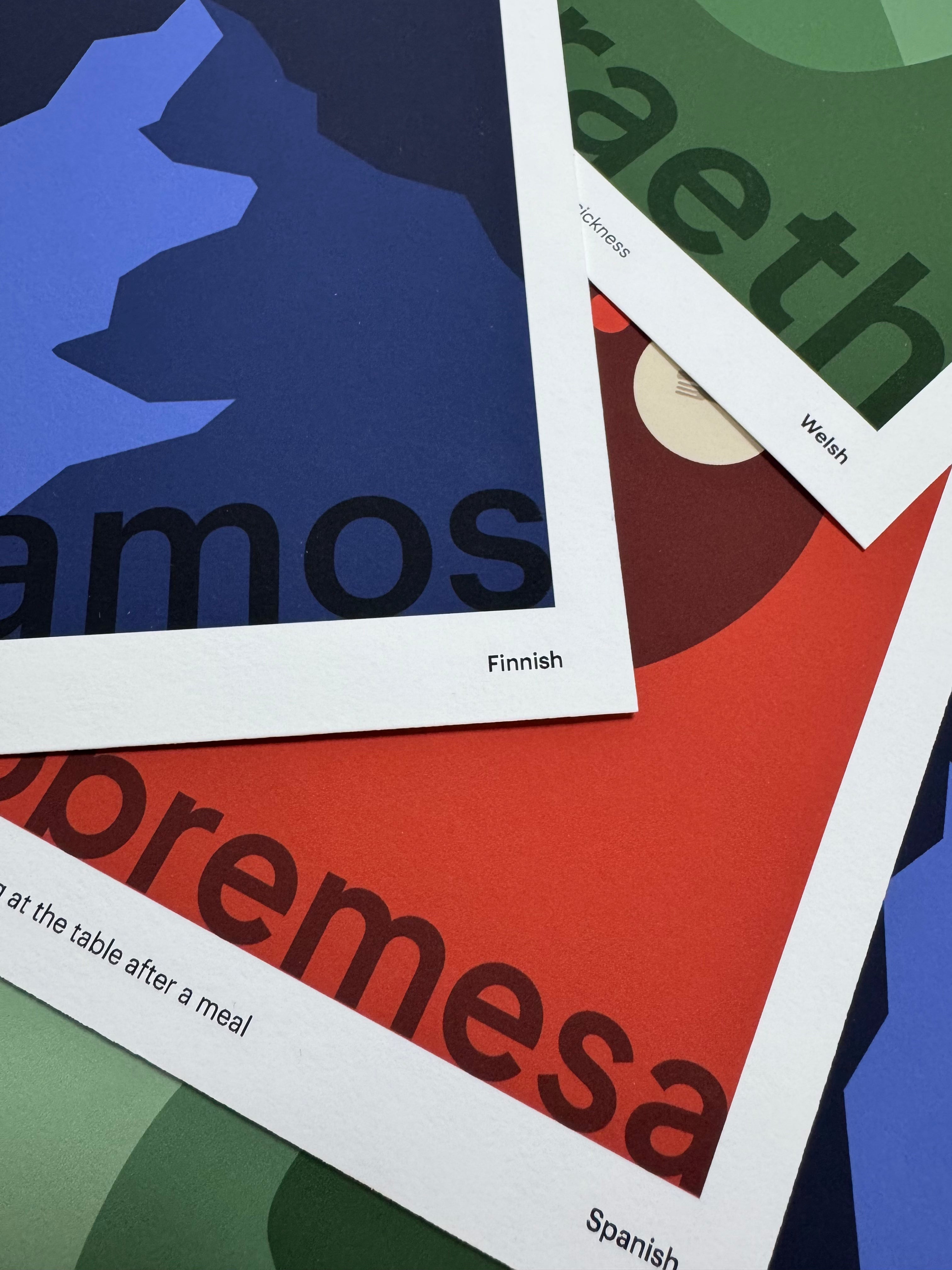 Overlapping coloured prints with different words on them